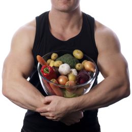 Muscular man with bowl of veggies.Size260jpg