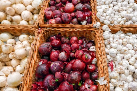 Baskets of Red and White Onions and Garlic