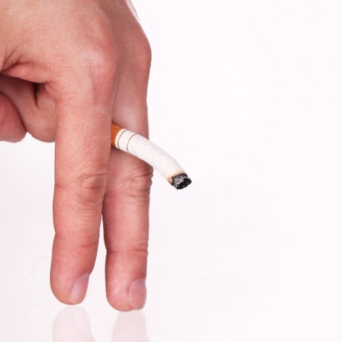 Limp Cigarette in Fingers