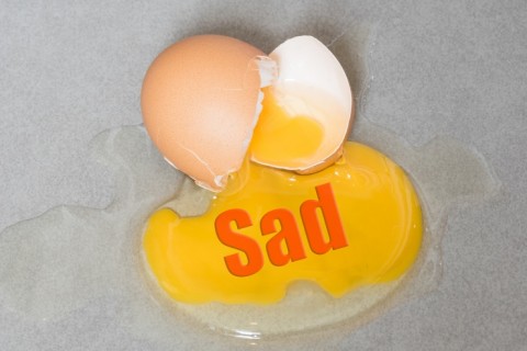 Sad Cracked Egg on Counter