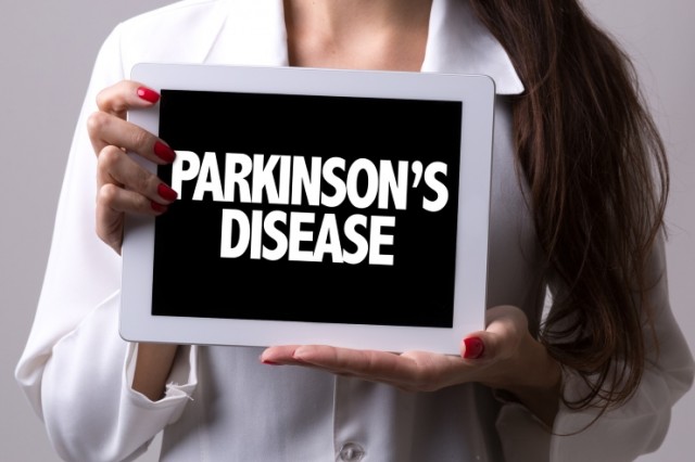 Female Doctor With Parkinson's Sign